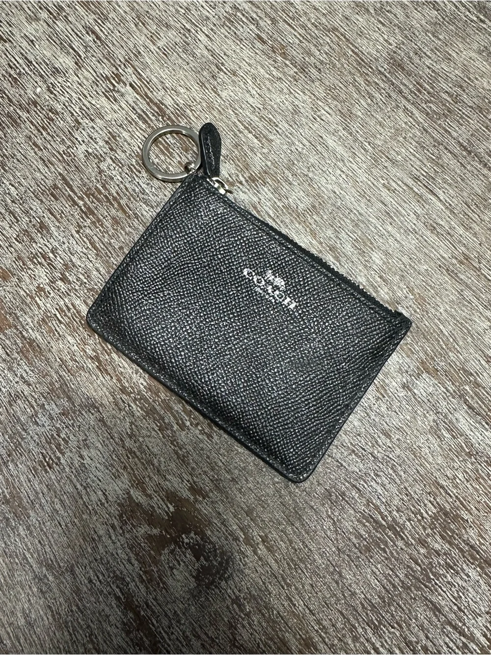 Coach slim zip